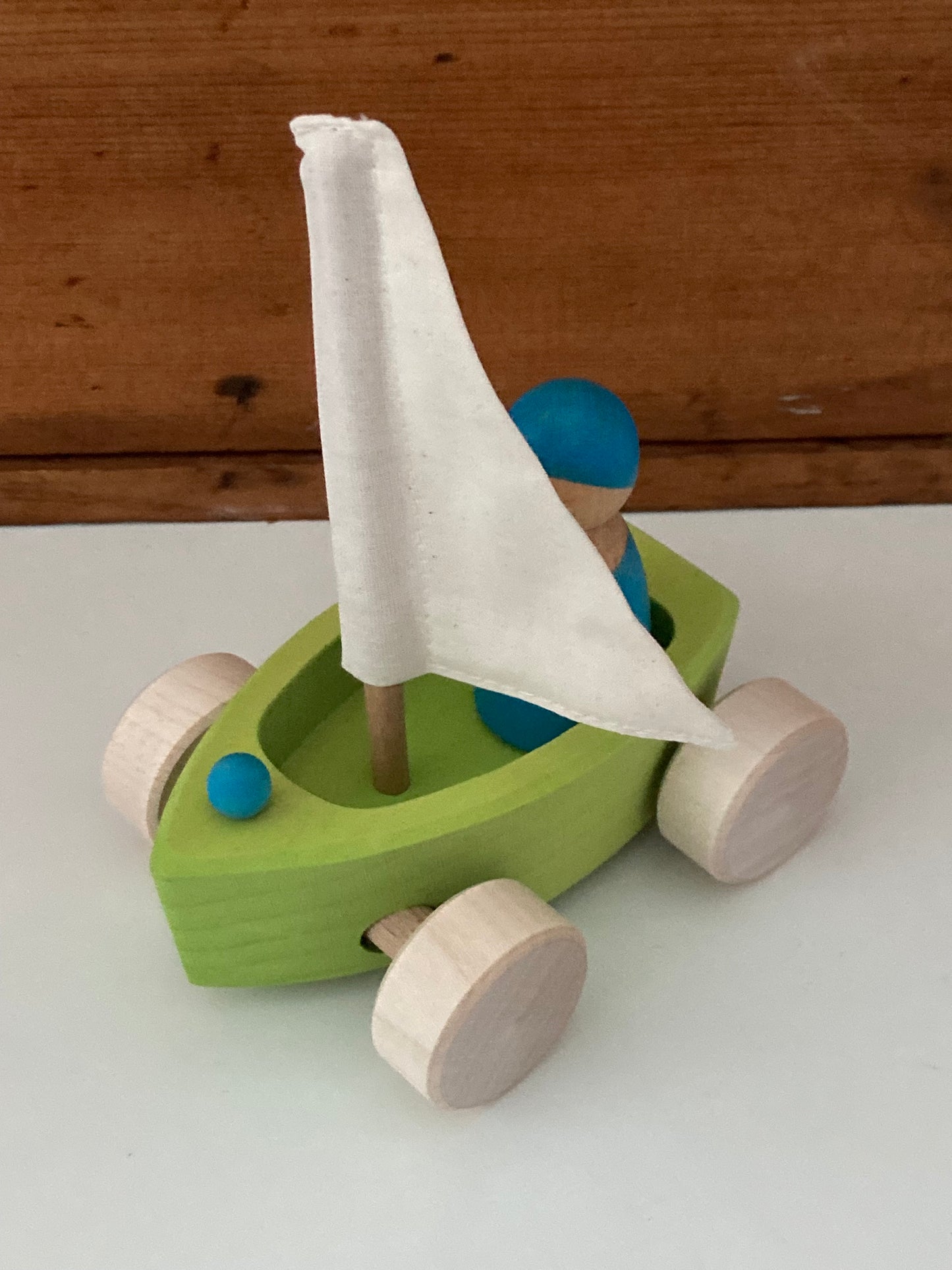 Wooden Toy - Grimm's SAILBOAT in GREEN, and SKIPPER in BLUE… on wheels!